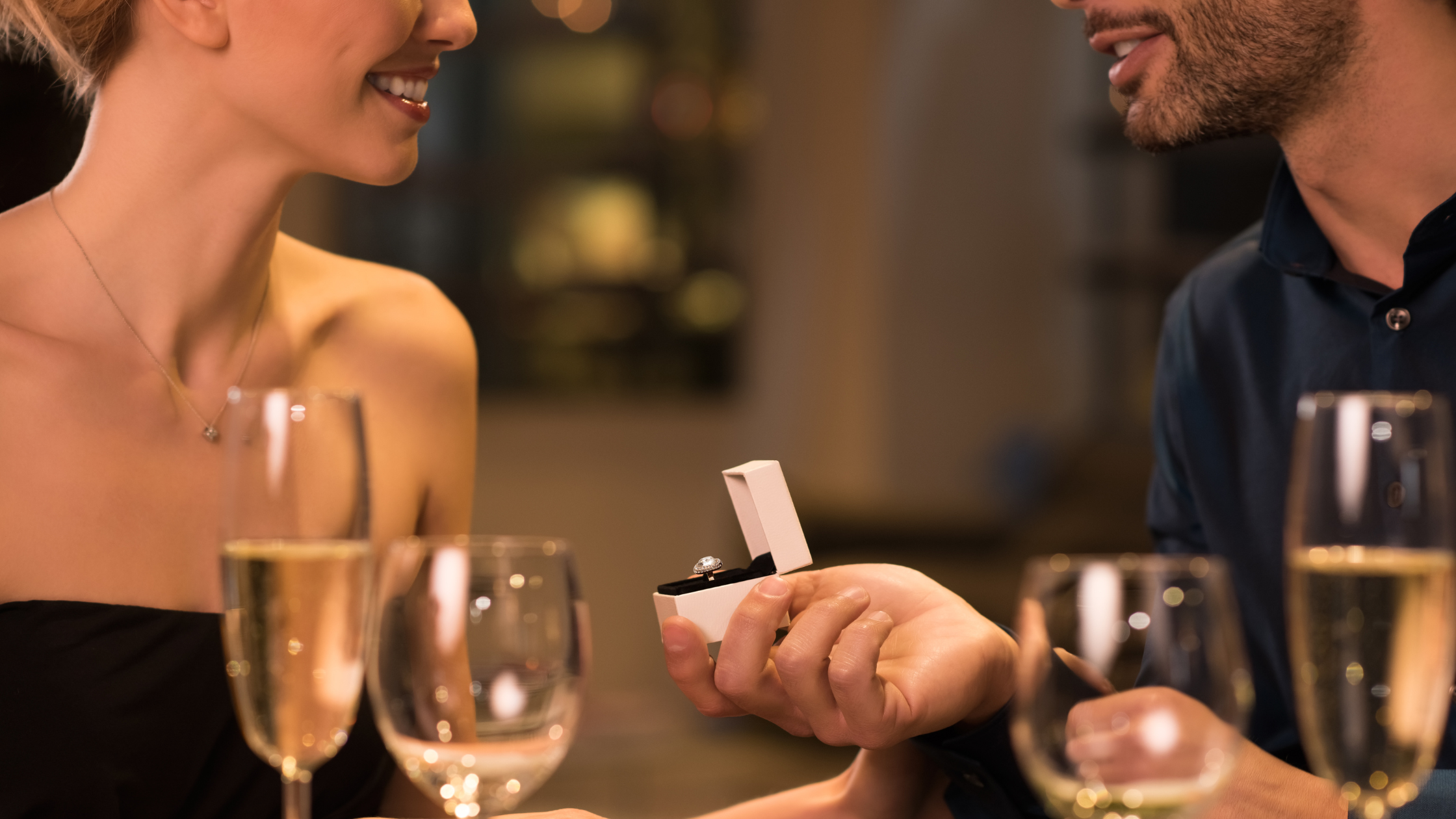Proposal celebration scene from Willow & Sage Catering's guide on memorable marriage proposals